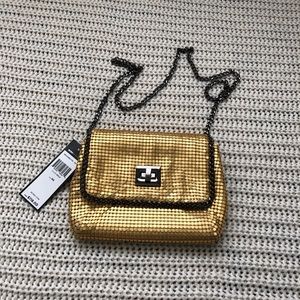BCBG Gold clutch brand new with the tag